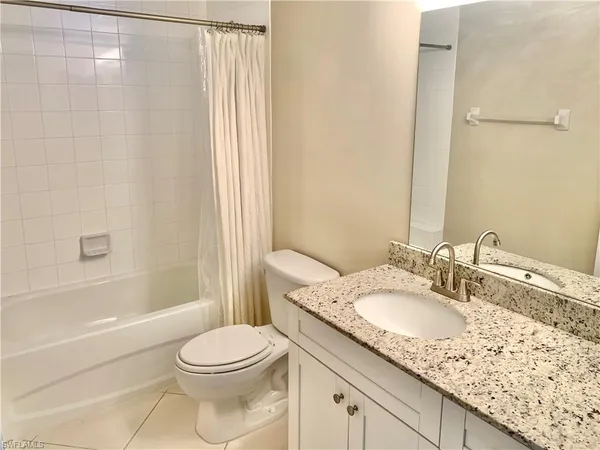 a view of a garden from a balcony