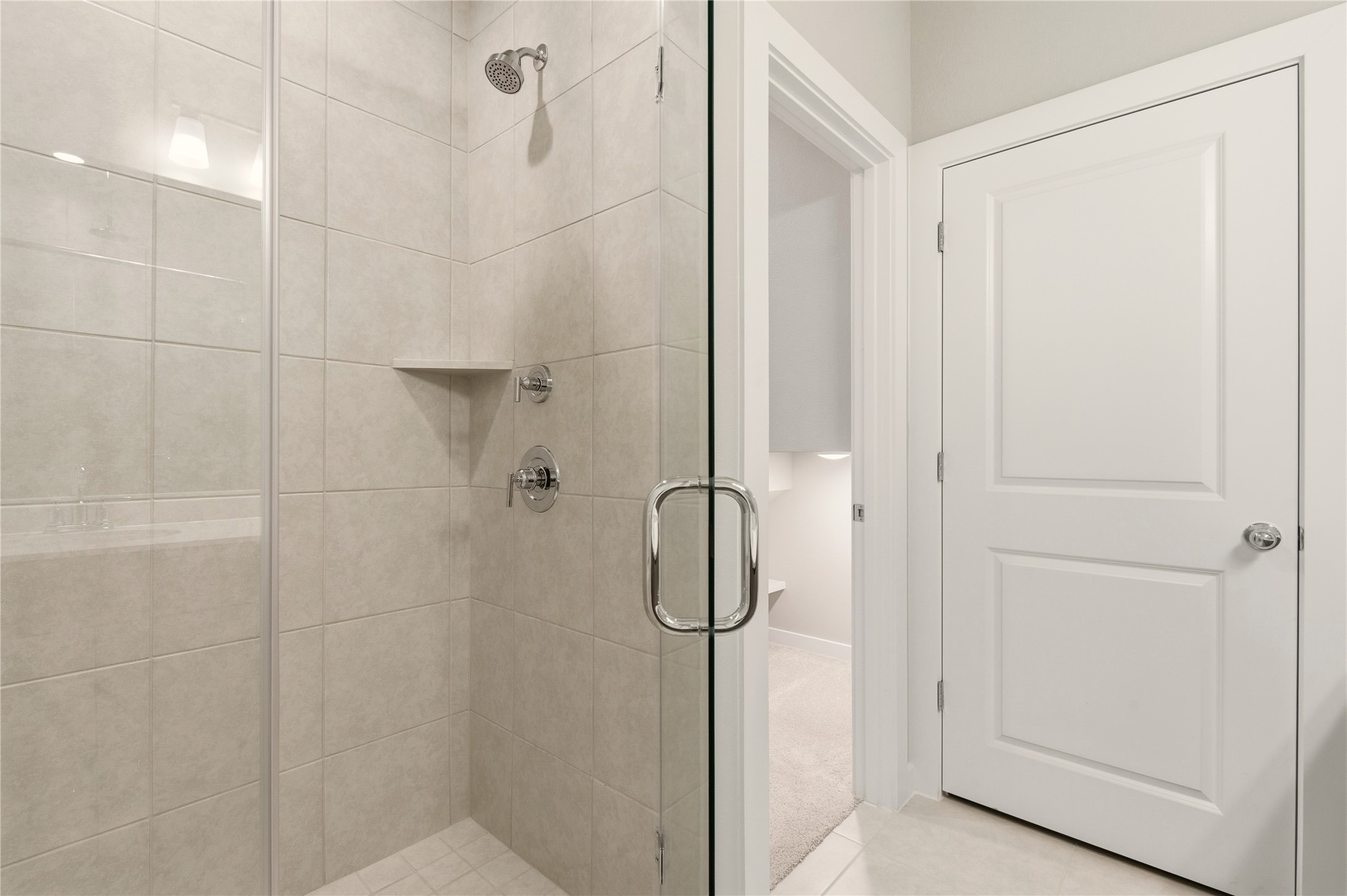 2201 Cento Walk Round Rock, TX 78664 - Photo 15 of 30 Full bath featuring a stall shower and light colored carpet