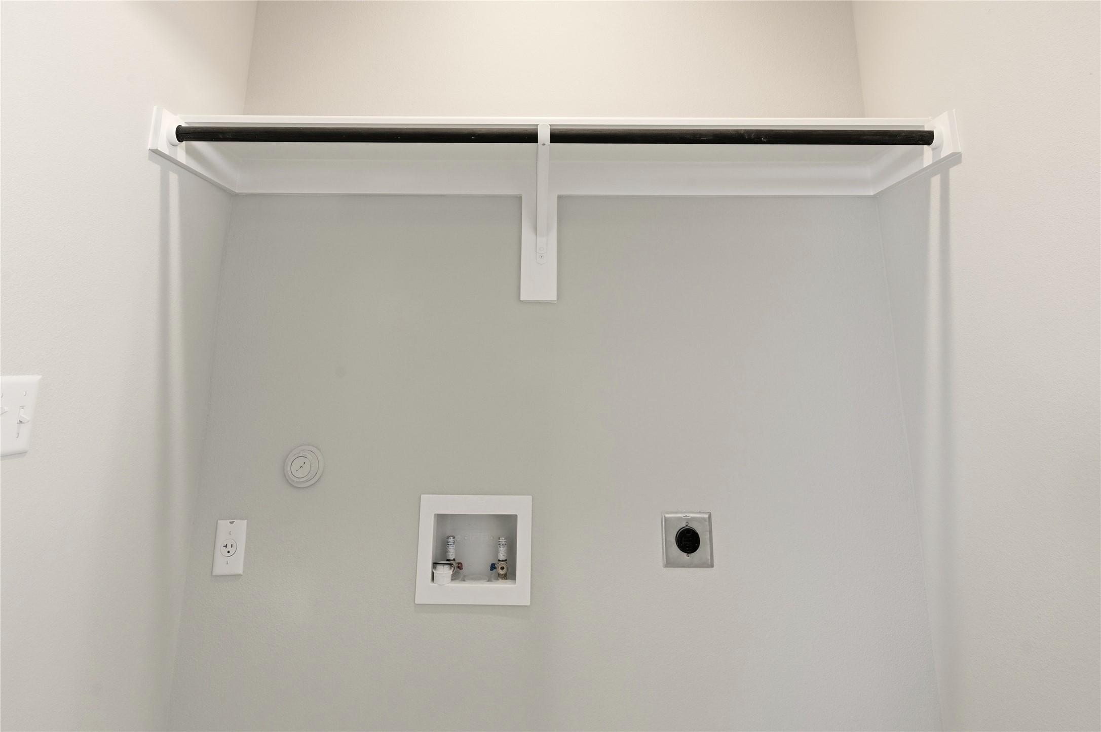 2201 Cento Walk Round Rock, TX 78664 - Photo 23 of 30 Laundry area with hookup for a washing machine, hookup for an electric dryer, and gas dryer hookup