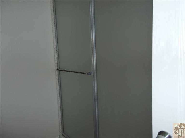12478 Redbud Road Desert Hot Springs, CA 92240 - Photo 14 of 21 a bathroom with a glass door