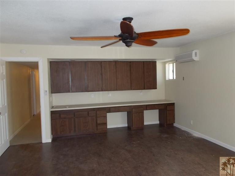 12478 Redbud Road Desert Hot Springs, CA 92240 - Photo 17 of 21 a view of room with a ceiling fan