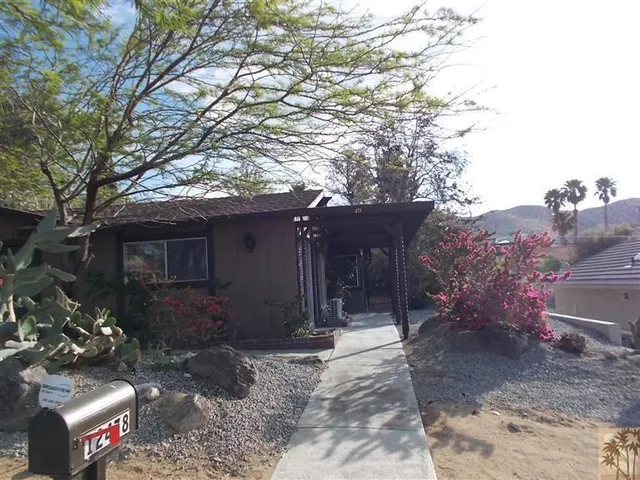 a house view with a outdoor space