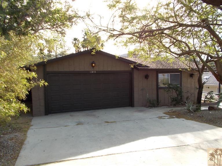 12478 Redbud Road Desert Hot Springs, CA 92240 - Photo 3 of 21 a view of a garage