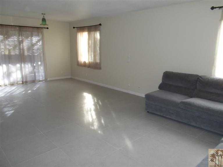 12478 Redbud Road Desert Hot Springs, CA 92240 - Photo 8 of 21 a living room with furniture and a window