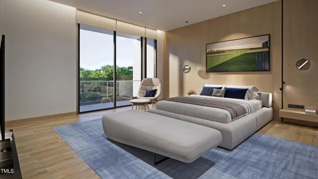 a bedroom with a large bed and a flat screen tv
