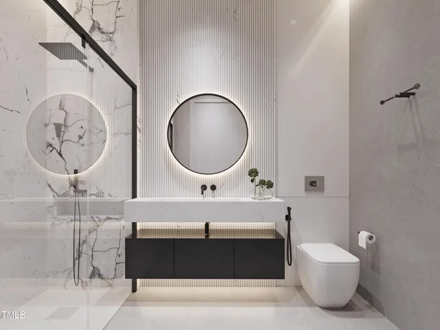 a bathroom with a bathtub and a mirror