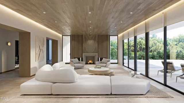 a bedroom with furniture and large windows