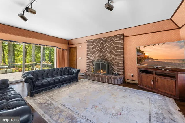 a kitchen with stainless steel appliances granite countertop a stove and a refrigerator