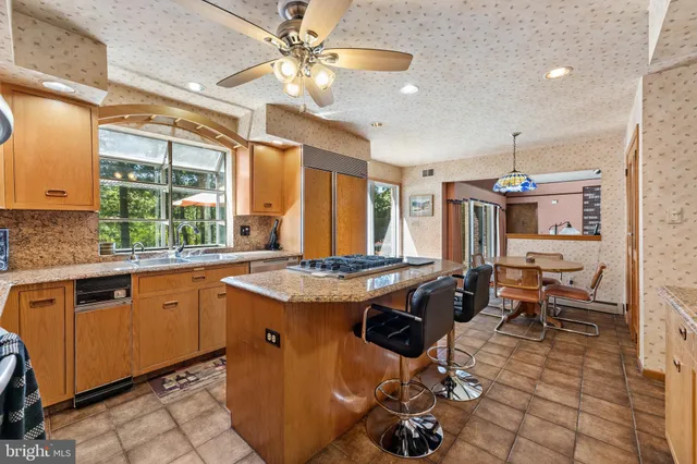 a view of wooden balcony with lake view