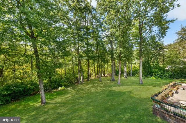 a view of backyard with a patio and outdoor seating