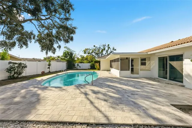 a view of a house with a swimming pool