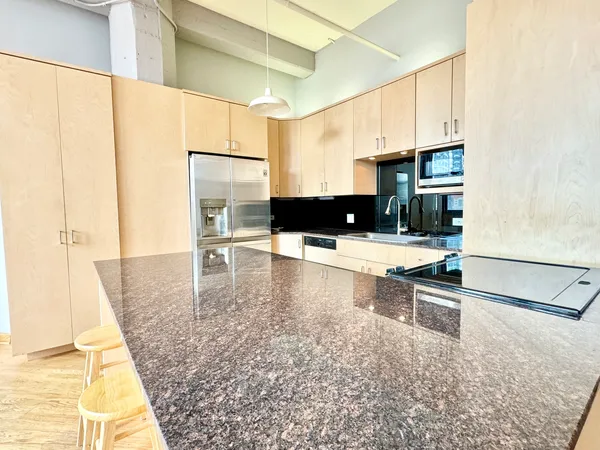 a view of a living room with a sink
