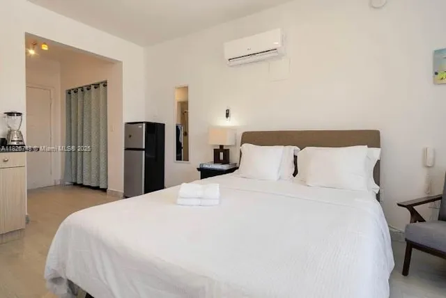 a view of a patio with table and chairs and potted plants