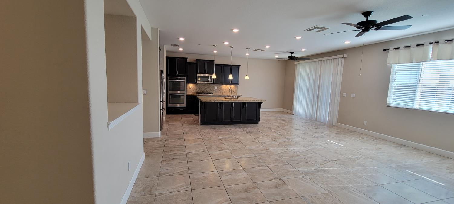 1052 Lavender Street Manteca, CA 95337 - Photo 7 of 29 living room and kitchen