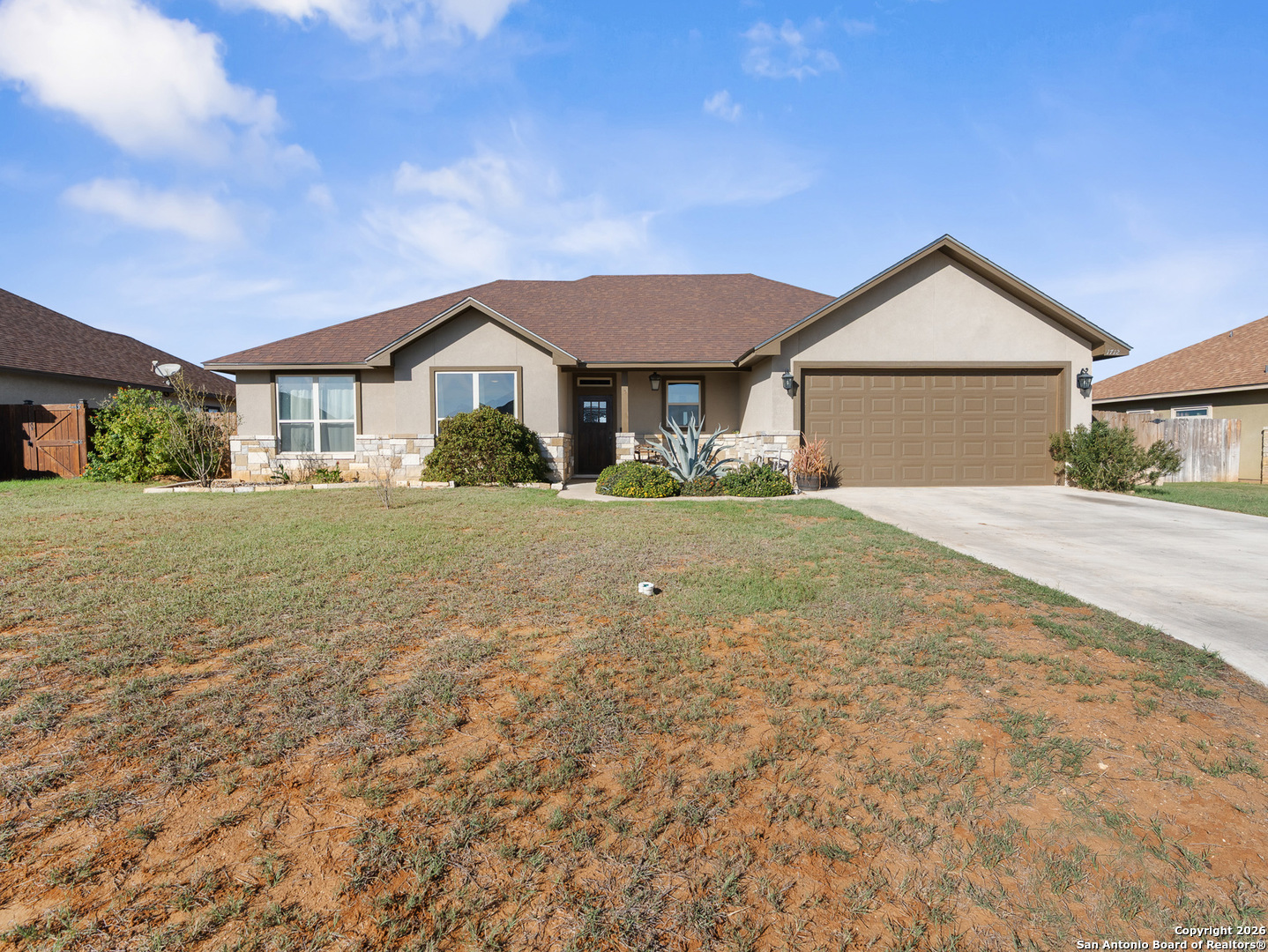 1712 Vista View Drive Pleasanton, TX 78064 - Photo 1 of 37 a front view of a house with yard and green space