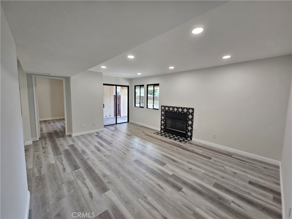 8307 Vineyard Avenue, Unit 5 Rancho Cucamonga, CA 91730 - Photo 1 of 1 a view of an empty room with a hallway