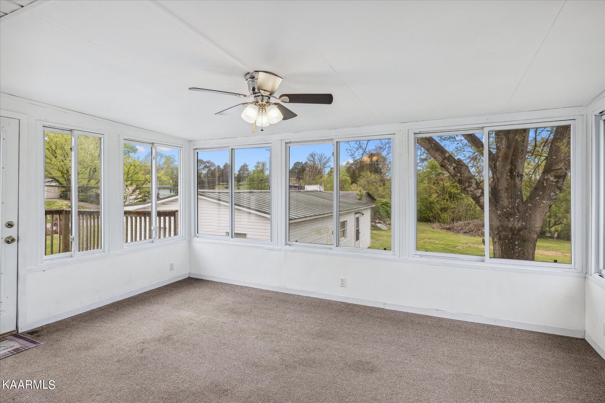 7001 Washington Pike Corryton, TN 37721 - Photo 17 of 33 17. Unit two sunporch