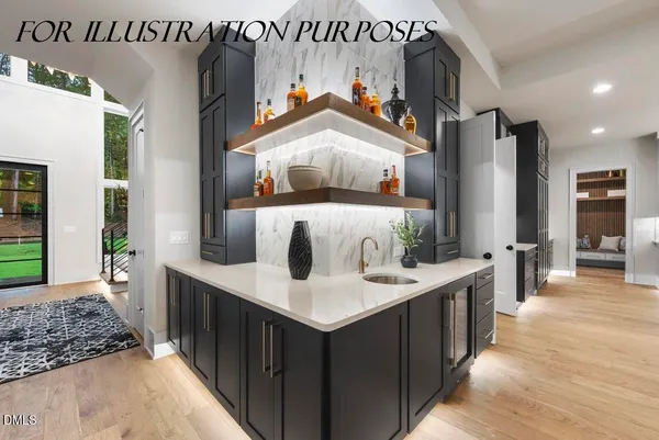 a kitchen with a sink and refrigerator