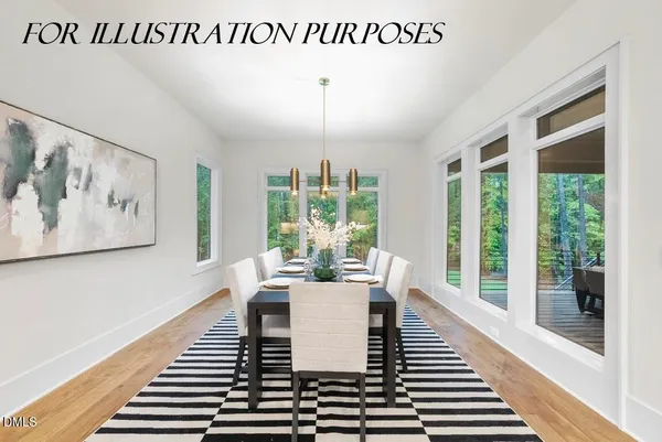 a dining room with table chairs and wooden floor