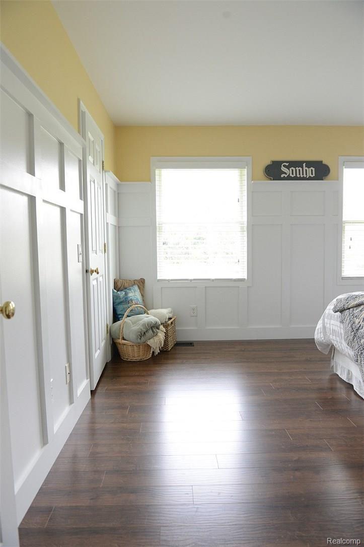 2800 Porter Road White Lake, MI 48383 - Photo 22 of 40 Custom wood paneling in first floor master bedroom