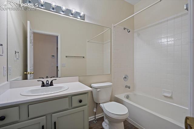 1110 Samuel Point Colorado Springs, CO 80906 - Photo 17 of 28 Full bathroom featuring tub / shower combination and vanity