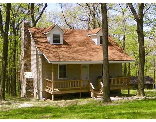 361 Sweitzer Road Mount Pleasant, PA 15666 - Photo 1 of 16 Exterior Front. Nestle in the wood in this 2 story home.