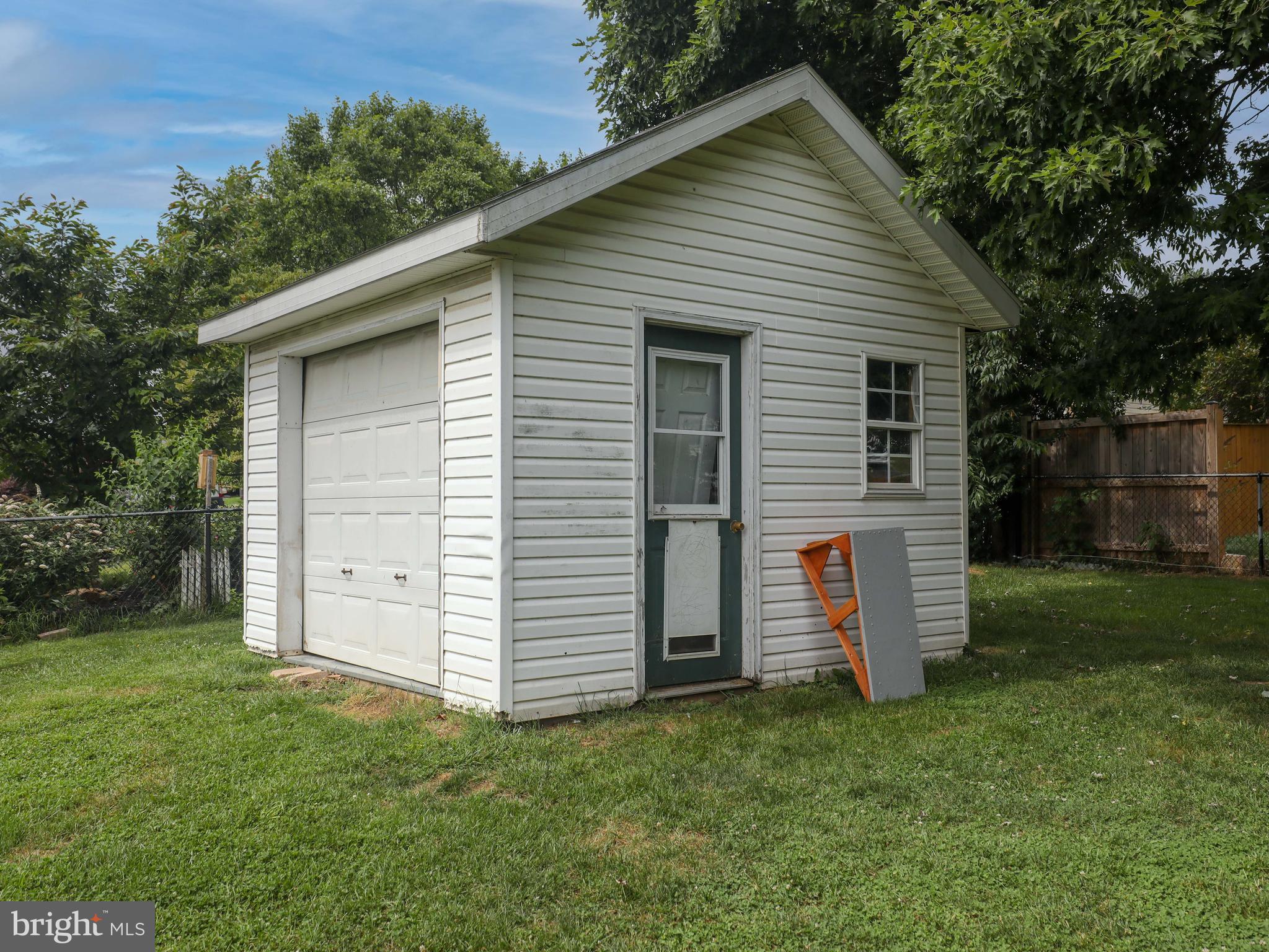25 Cottontail Court Ranson, WV 25438 - Photo 33 of 34 Shed with a garage door