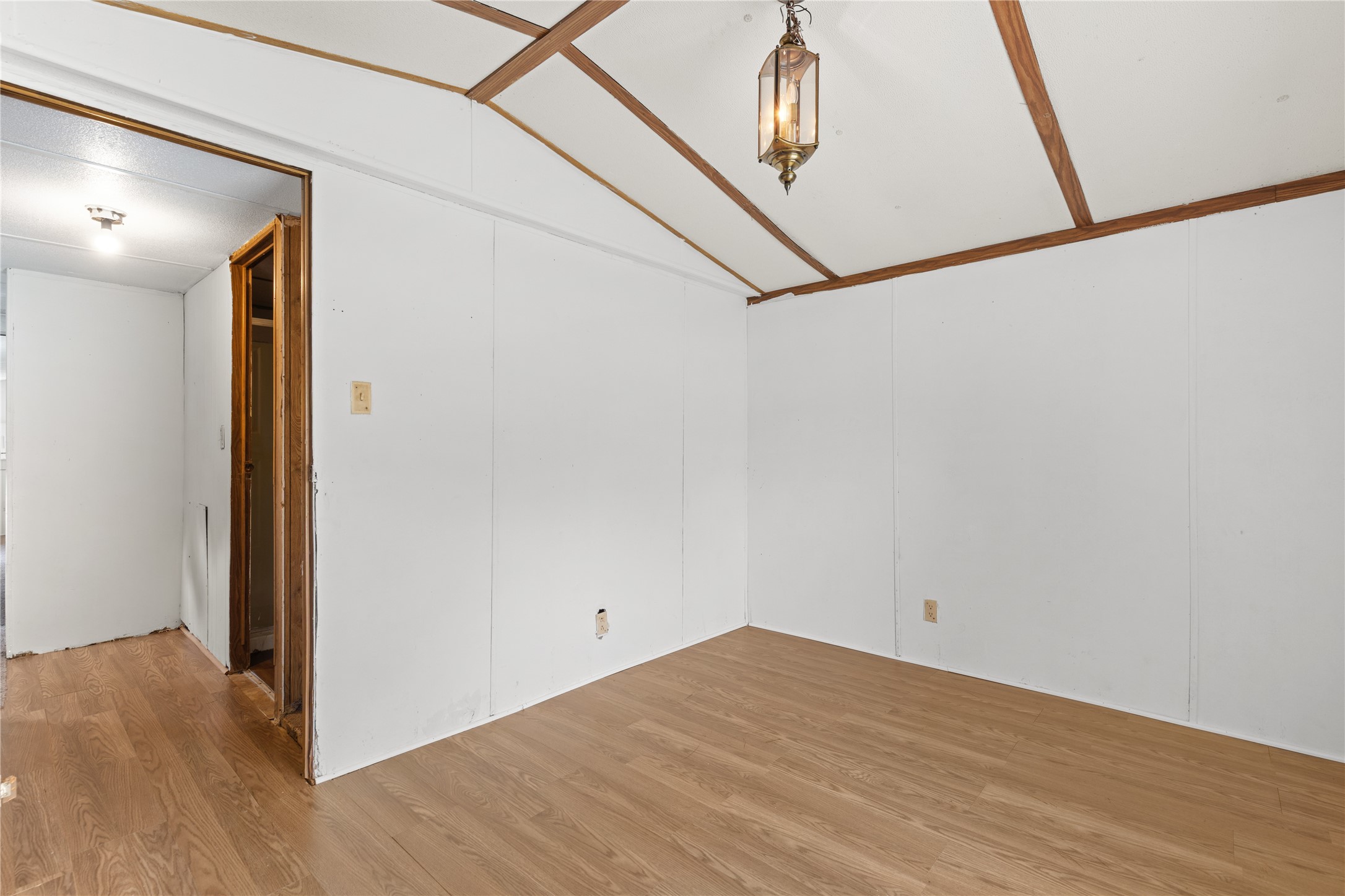370 Lakeside Drive Trinity, TX 75862 - Photo 11 of 23 a view of a room with wooden floor and white walls