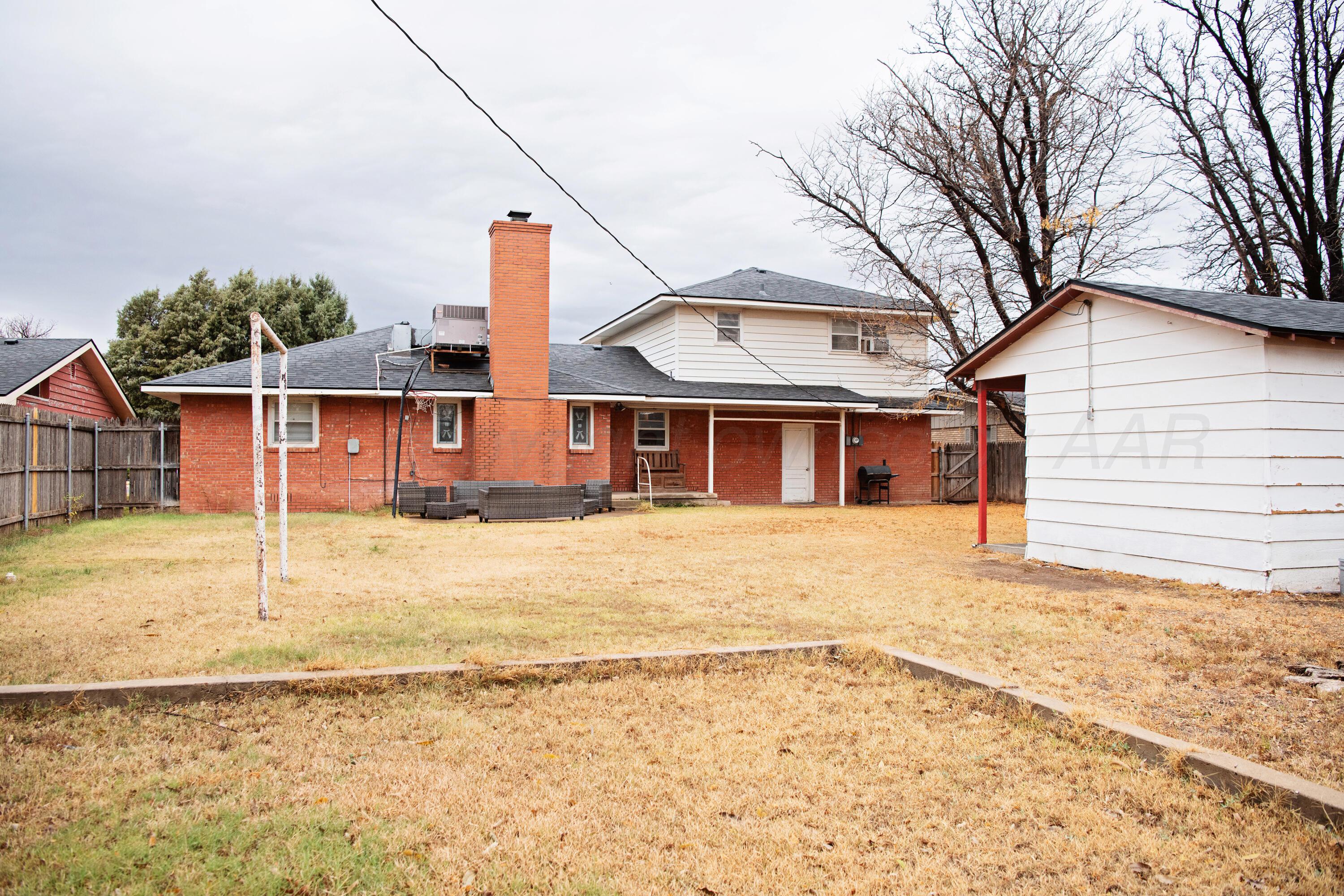 418 Star Street Hereford, TX 79045 - Photo 17 of 17 a front view of a house with a yard