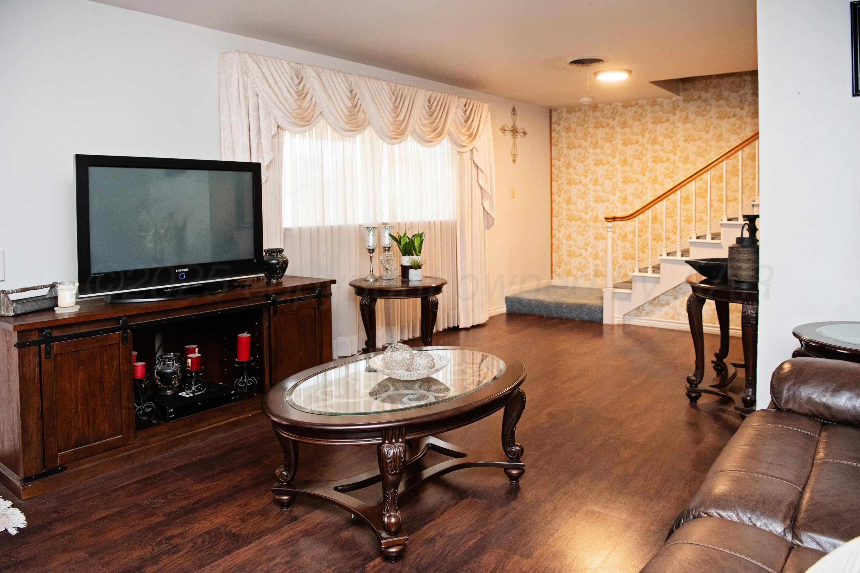 418 Star Street Hereford, TX 79045 - Photo 6 of 17 a living room with furniture and a flat screen tv