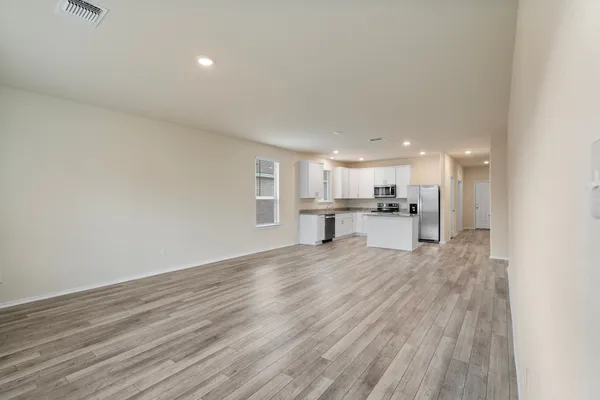a view of kitchen with wooden floor