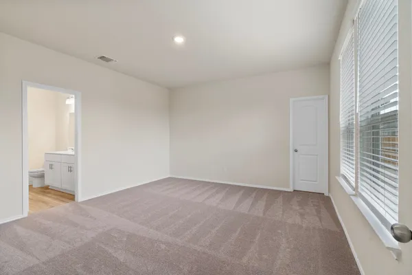 a view of an empty room and window