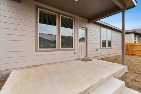 a view of a backyard of a house