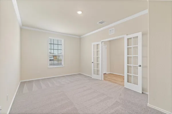 an empty room with windows