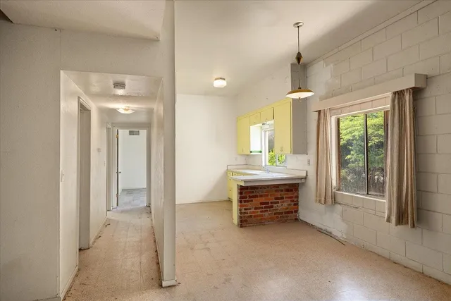 a view of a balcony with chairs