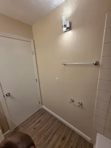 a view of a backyard with sitting area