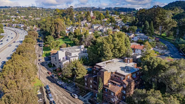 an aerial view of a city with lots of residential buildings