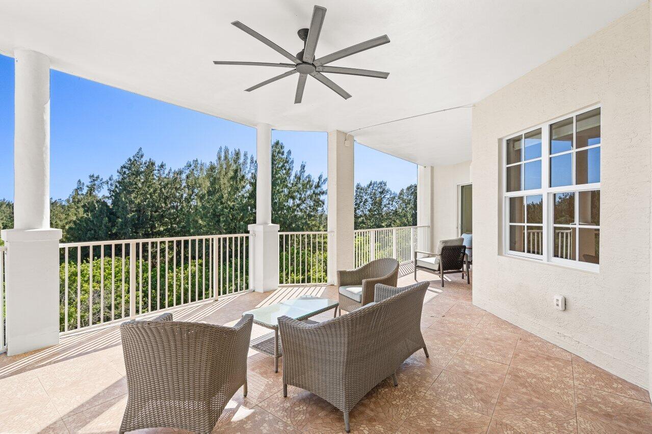 3000 Florida A1A, Unit 302 Daytona Beach, FL 32118 - Photo 34 of 48 a living room with furniture and a large window