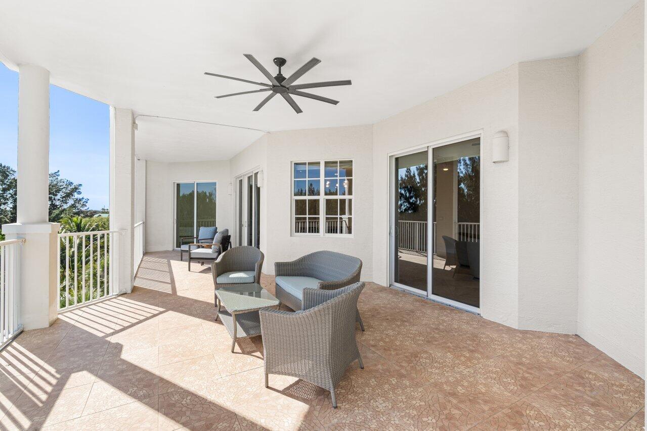 3000 Florida A1A, Unit 302 Daytona Beach, FL 32118 - Photo 35 of 48 a living room with furniture and a window