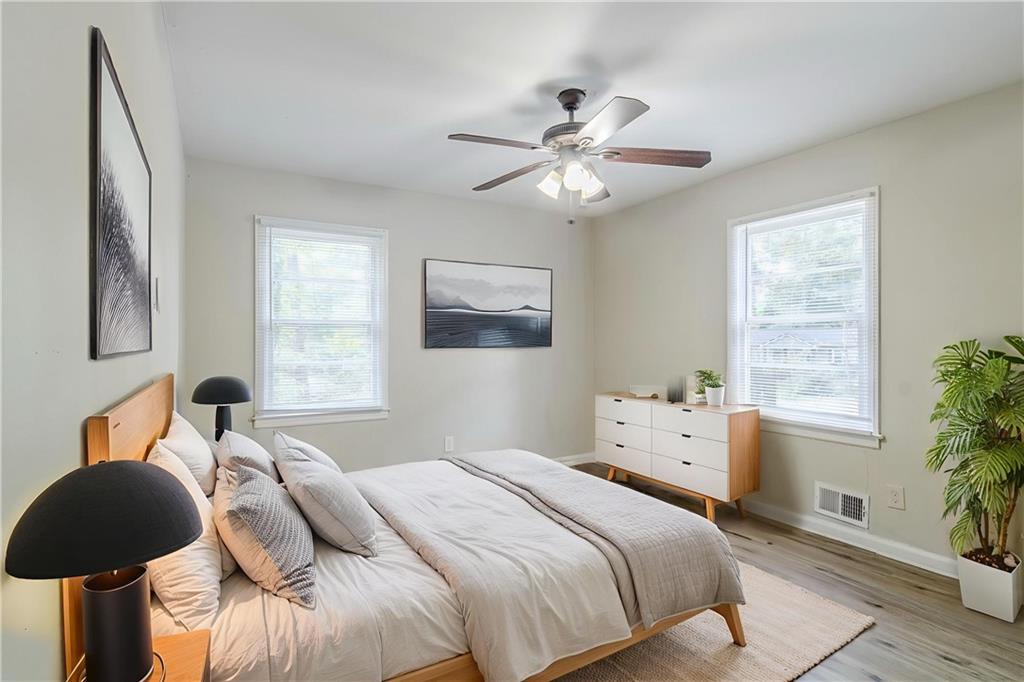 6281 Denny Lane Southwest Mableton, GA 30126 - Photo 15 of 27 a bedroom with a bed and a window