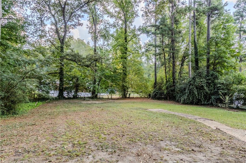 6281 Denny Lane Southwest Mableton, GA 30126 - Photo 26 of 27 a view of a trees in a yard