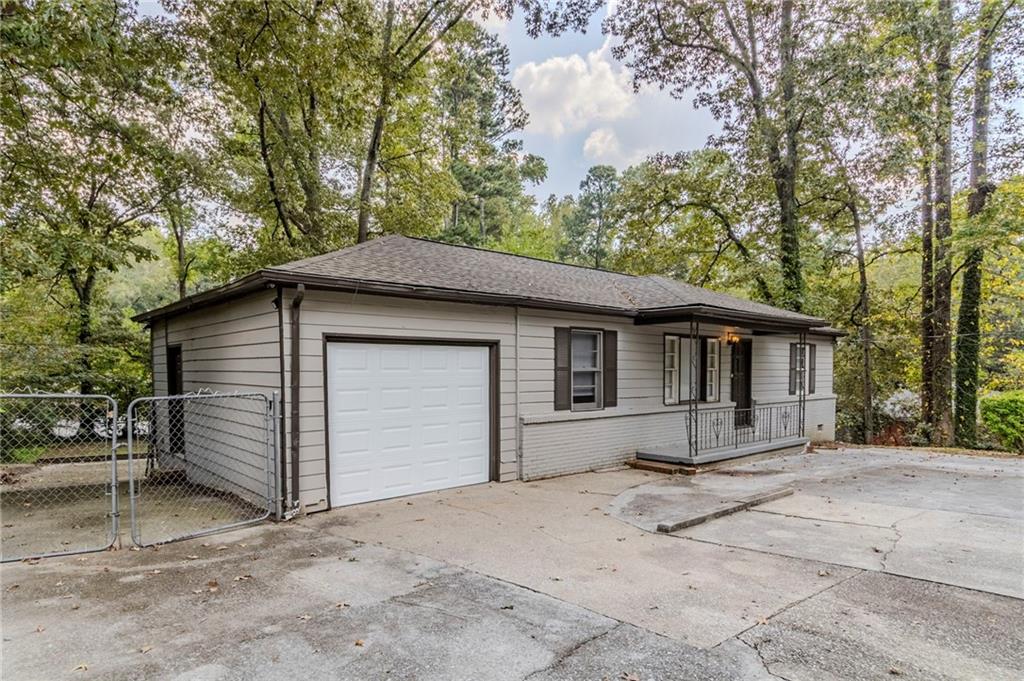 6281 Denny Lane Southwest Mableton, GA 30126 - Photo 3 of 27 a house with a outdoor space