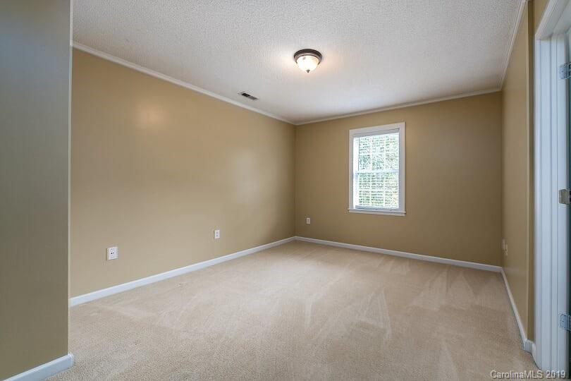 7734 Red Robin Trail Denver, NC 28037 - Photo 15 of 15 a view of an empty room with a window