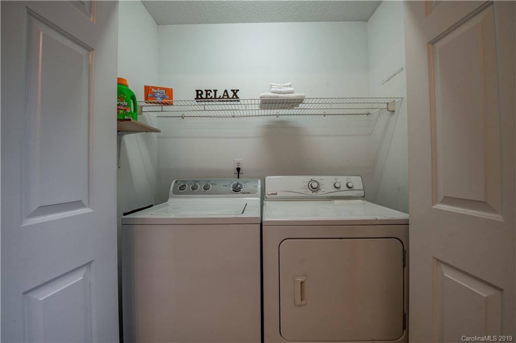 7734 Red Robin Trail Denver, NC 28037 - Photo 8 of 15 a utility room with dryer and washer