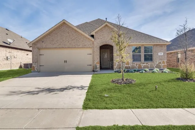 a front view of house with yard