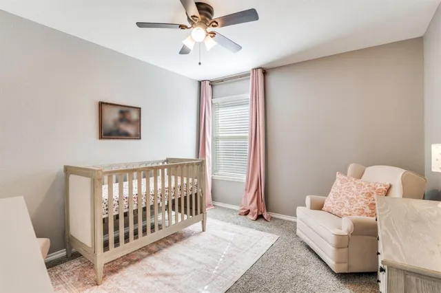 a bed room with a bed and a couch