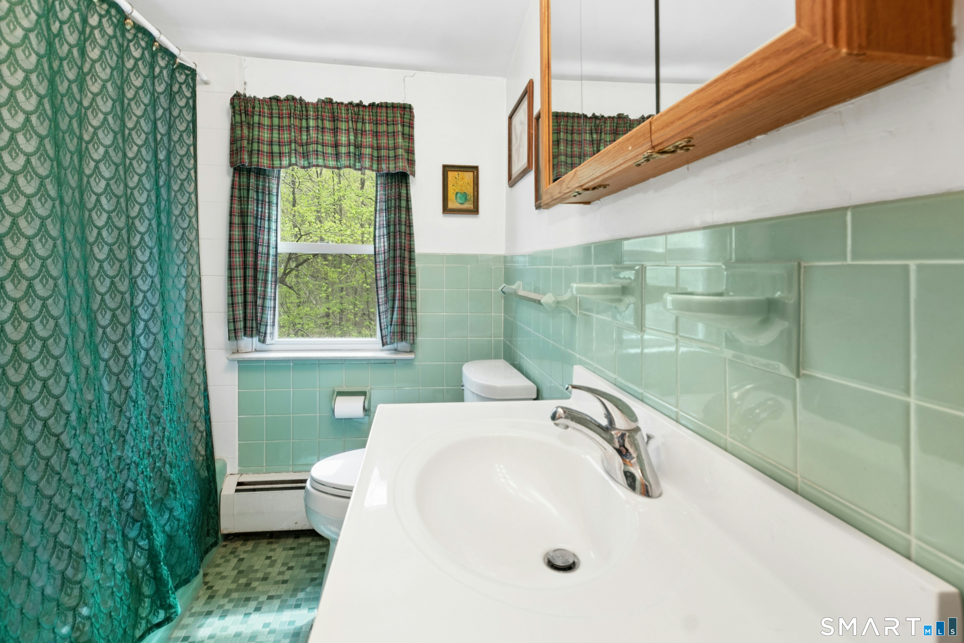 15 Limestone Terrace Ridgefield, CT 06877 - Photo 18 of 32 a bathroom with a sink a toilet and a shower