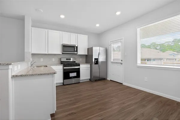 $2,000 | 13312 Burbot Drive, Conroe, TX 77384