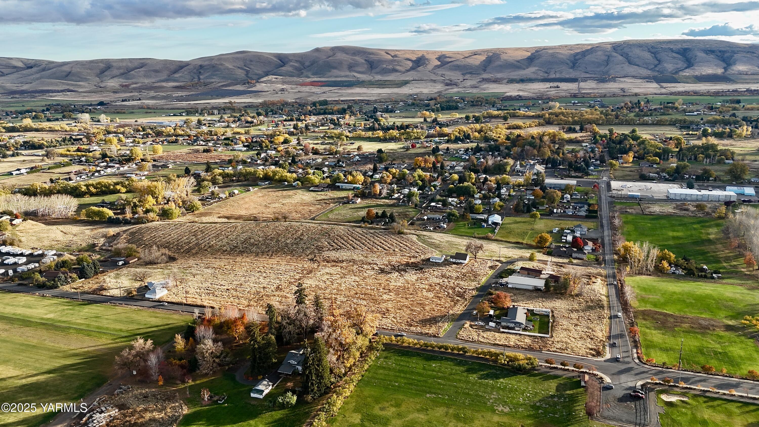8400 Occidental Road Yakima, WA 98903 - Photo 7 of 9 an aerial view of residential houses with outdoor space