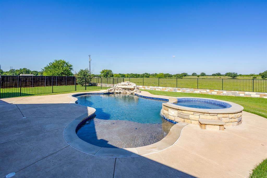 733 Fm 2652 Graham, TX 76450 - Photo 30 of 40 a view of a swimming pool and lounge chair